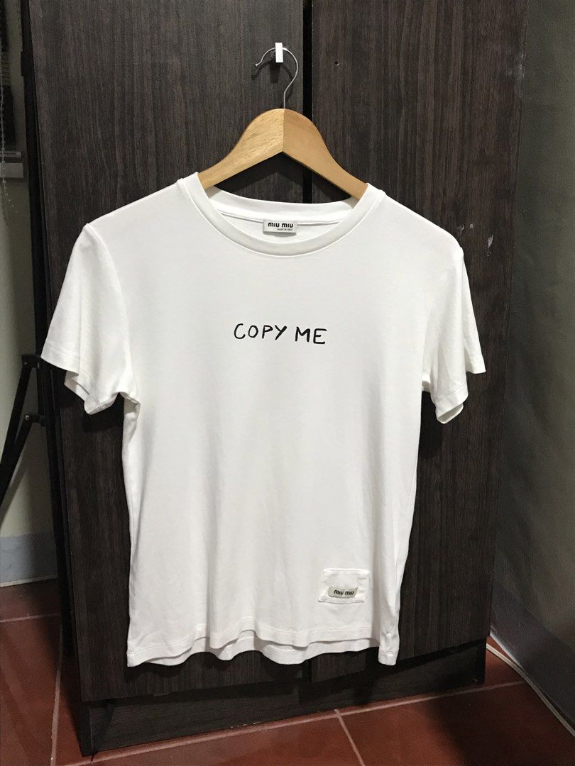 Miu Miu White Copy Me Shirt (Category: Tshirts & Polo Shirts ) located in Bulacan. Submitted by dailybumps (Listing ID 1455051370, Image 3). Description: 19x24 Authentic No issue Soft cotton.