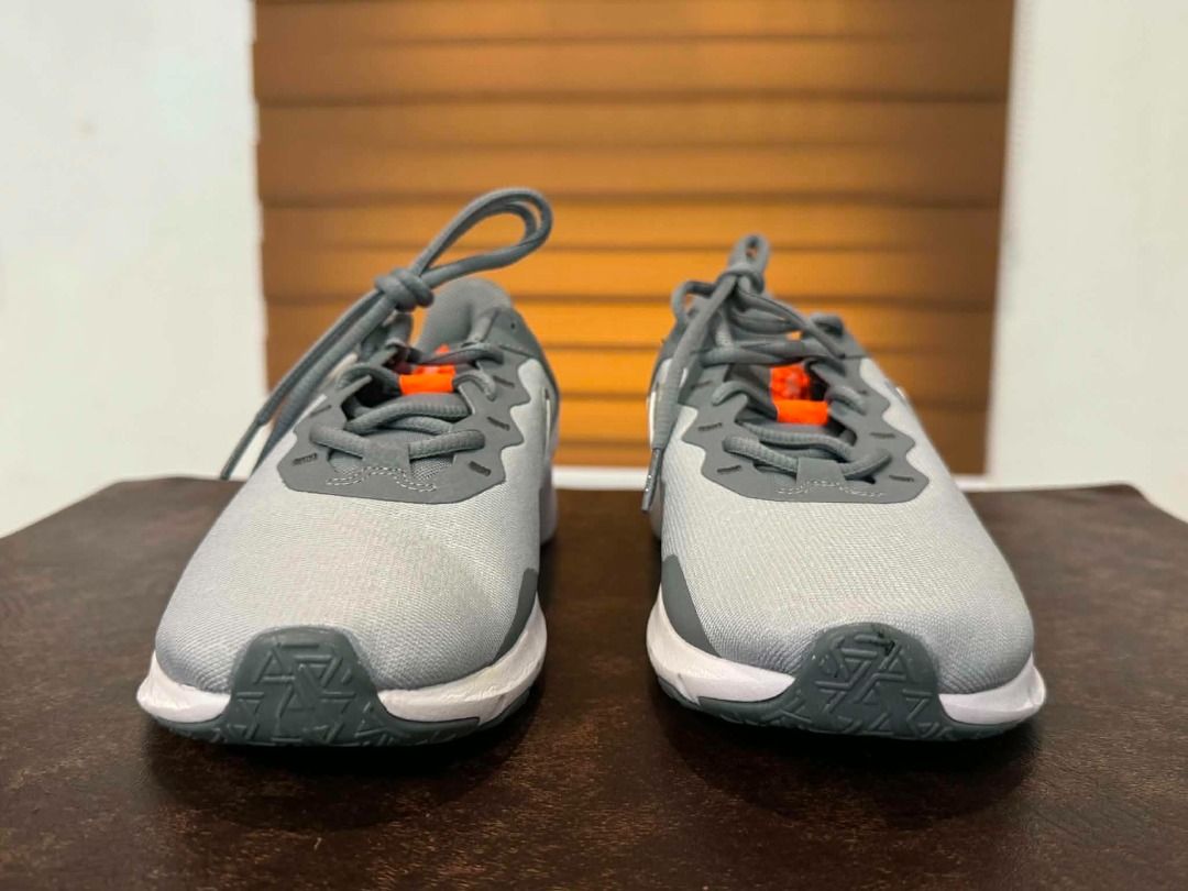 Nike Legend Essential 2 "Wolf Grey Total Orange" | US 7 | Authentic | Deadstock (Category: Sneakers) located in Paranaque City. Submitted by juliusd23 (Listing ID 1455003194, Image 2). Description: Size: US 7 / UK 6 / EUR 40 / 25cm — check the size chart, this one runs true-to-size for most. 💯 100% Authentic — verified style code CQ9356-007, matching UPC, and factory QR tag (photos of the label included, so you can double-check before you even m
