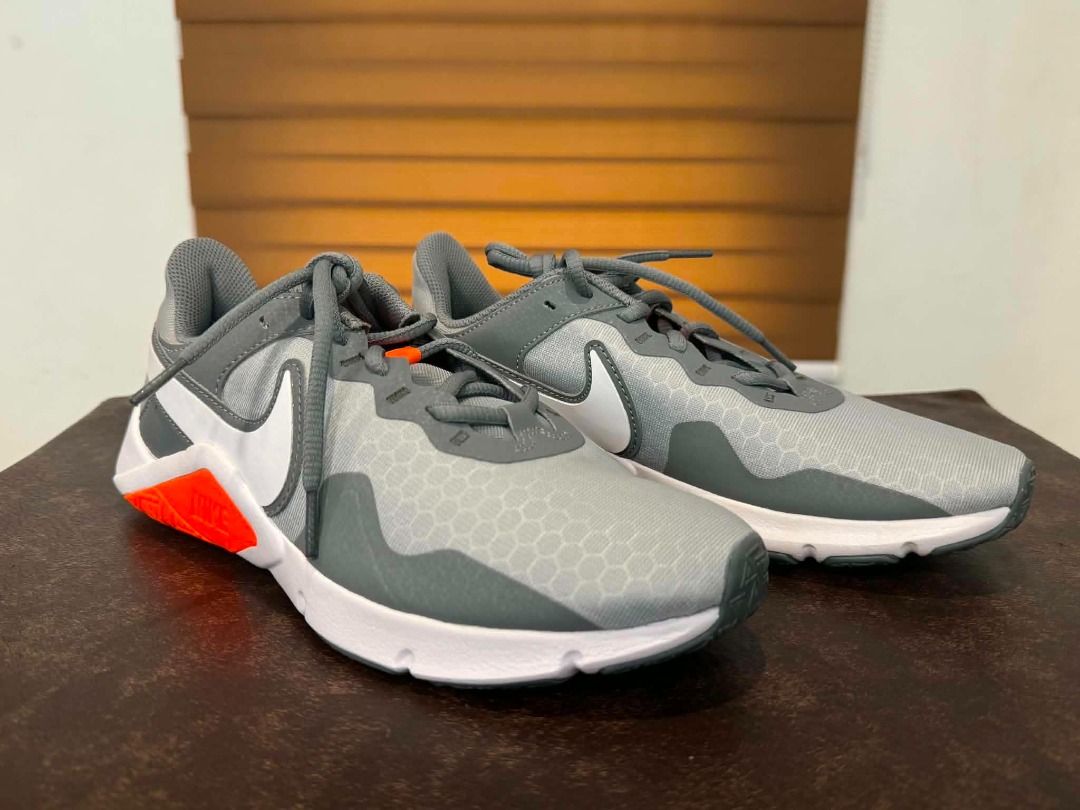 Nike Legend Essential 2 "Wolf Grey Total Orange" | US 7 | Authentic | Deadstock (Category: Sneakers) located in Paranaque City. Submitted by juliusd23 (Listing ID 1455003194, Image 3). Description: Size: US 7 / UK 6 / EUR 40 / 25cm — check the size chart, this one runs true-to-size for most. 💯 100% Authentic — verified style code CQ9356-007, matching UPC, and factory QR tag (photos of the label included, so you can double-check before you even m