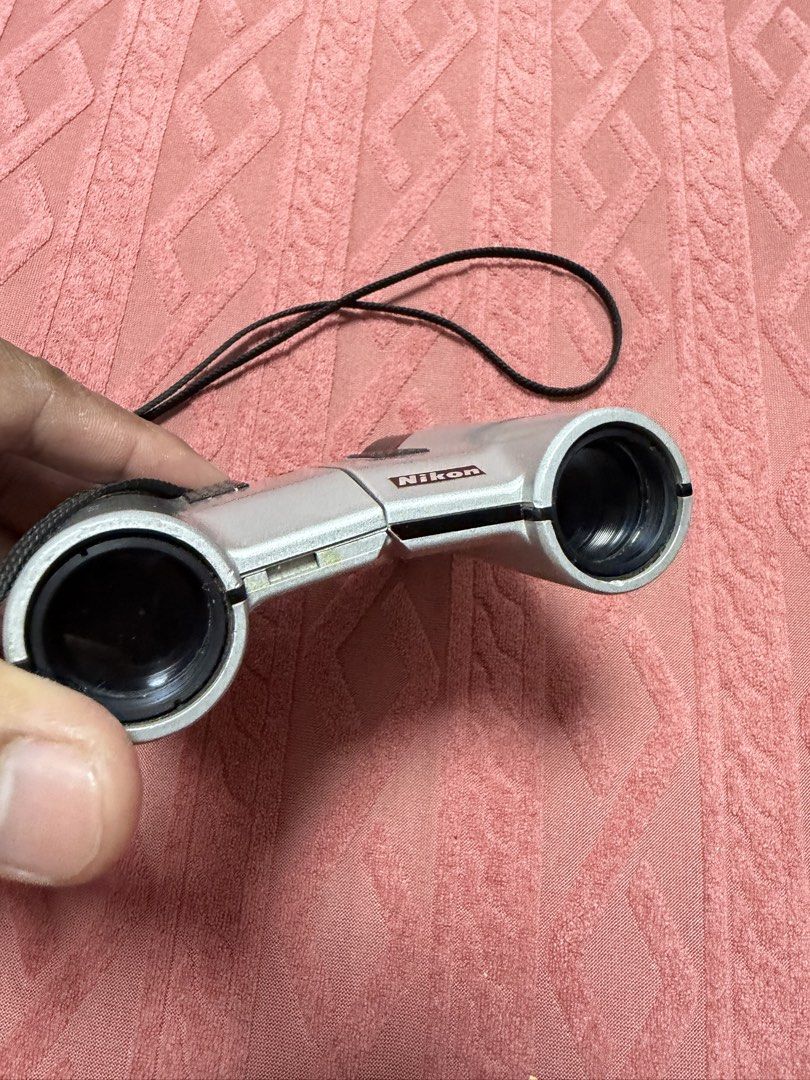 Nikon 6x20 7.5 binoculars Japan (Category: Lens & Kits) located in Paranaque City. Submitted by pooldepot011304 (Listing ID 1455104310, Image 2). Description: - Nikon 6x20 7.5 Binoculars - Compact and Silver - Made in Japan - Includes Neck Strap - Clear Lenses - Minor Scuffs on Body - Ideal for Bird Watching & Outdoor Events.
