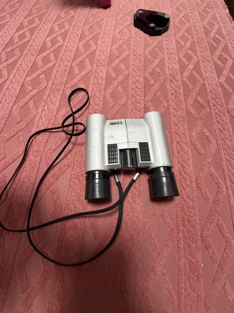 Nikon 6x20 7.5 binoculars Japan (Category: Lens & Kits) located in Paranaque City. Submitted by pooldepot011304 (Listing ID 1455104310, Image 3). Description: - Nikon 6x20 7.5 Binoculars - Compact and Silver - Made in Japan - Includes Neck Strap - Clear Lenses - Minor Scuffs on Body - Ideal for Bird Watching & Outdoor Events.