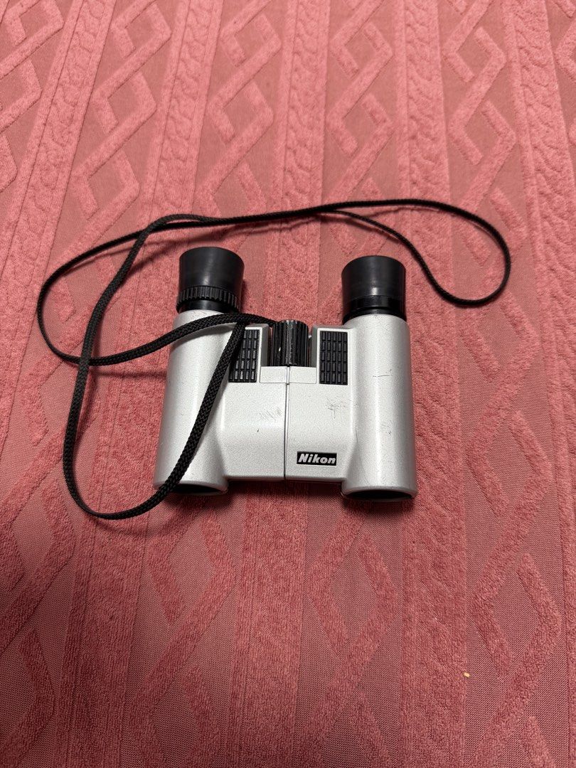 Nikon 6x20 7.5 binoculars Japan (Category: Lens & Kits) located in Paranaque City. Submitted by pooldepot011304 (Listing ID 1455104310, Image 1). Description: - Nikon 6x20 7.5 Binoculars - Compact and Silver - Made in Japan - Includes Neck Strap - Clear Lenses - Minor Scuffs on Body - Ideal for Bird Watching & Outdoor Events.