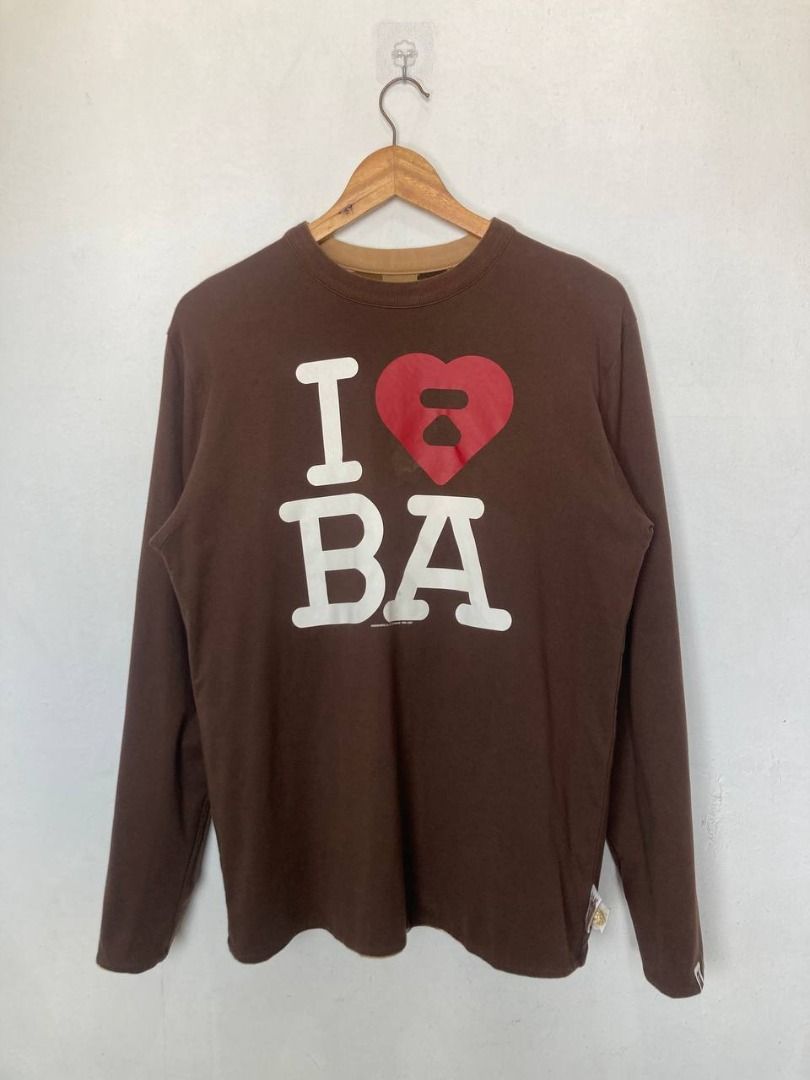 OG Bape 1st Camou Reversible Sweatshirt (Category: Sleep and Loungewear) located in Quezon City. Submitted by stylenpick (Listing ID 1455131274, Image 1). Description: Brand: Bape Made in: Japan Year: 2007 Material: Cotton Color: Brown Marked size: Sizing: Measurements (laid flat): Shoulders: 18" Sleeves: 25” Width: 20” Hem: 21" Length: 27” Color rating: 8/10 Condition: 8/10 Flaws: stain/discoloration, signs of usage .