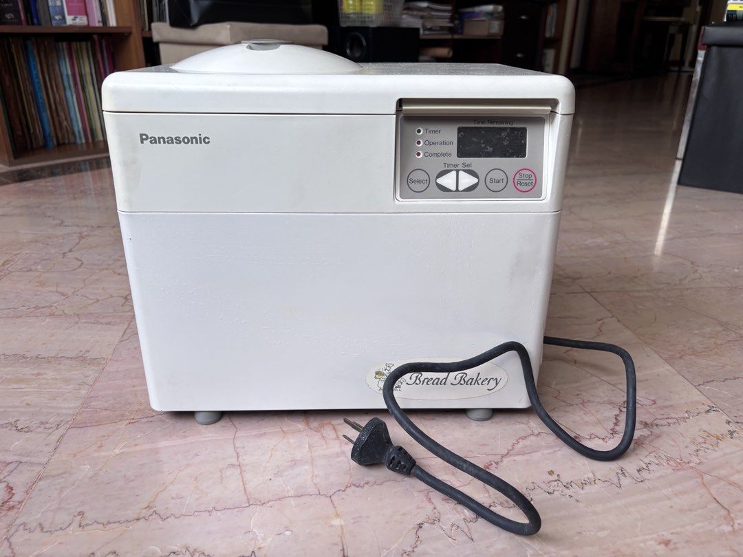 Panasonic Breadmaker (Category: Breadmakers) located in Singapore. Submitted by shl_shl (Listing ID 1455080990, Image 1). Description: Panasonic Breadmaker, pretty old. Last used maybe 15 years ago and kept in storage since then. Have not tested to see if it’s still working. All parts intact, but no instruction manual. I suggest you change the plug! Pick up from off Tanjong Katong Road. No meetup or delivery (item is heavy). .