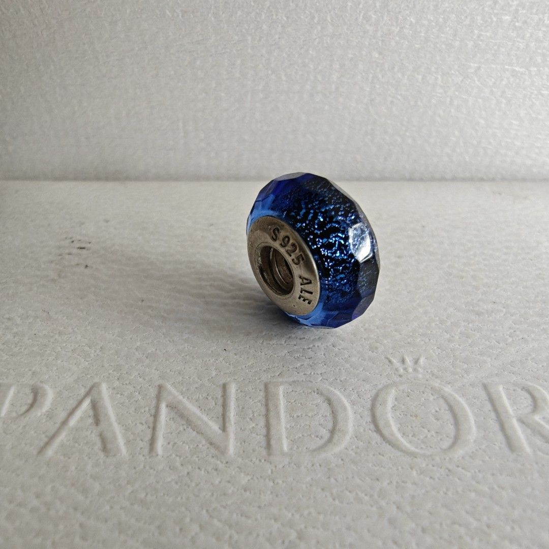 Pandora blue shimmer murano (Category: Charms) located in Makati City. Submitted by ly12eb (Listing ID 1455024244, Image 1). Description: Authentic Excellent condition with a few tiny dents, not noticeable.