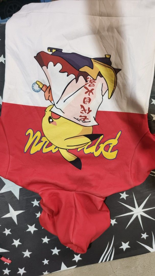 Pikachu Hoodie (Category: Hoodies) located in Manila. Submitted by jay_aint_jay (Listing ID 1455008604, Image 2). Description: - Red and white hoodie - Features a Pikachu graphic - Japanese text on front and back - Long sleeves with ribbed cuffs - Drawstring hood - Ideal for anime enthusiasts.