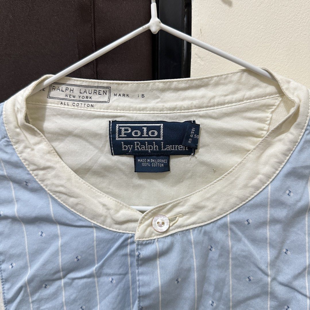 Polo Ralph Lauren Long Sleeve Shirt (Category: Longsleeves) located in Bulacan. Submitted by enne_123 (Listing ID 1455093721, Image 2). Description: - Polo by Ralph Lauren white long sleeve shirt - Features a light blue bib with subtle pinstripes and small dot patterns - Button closure on the bib - Made of 100% cotton.