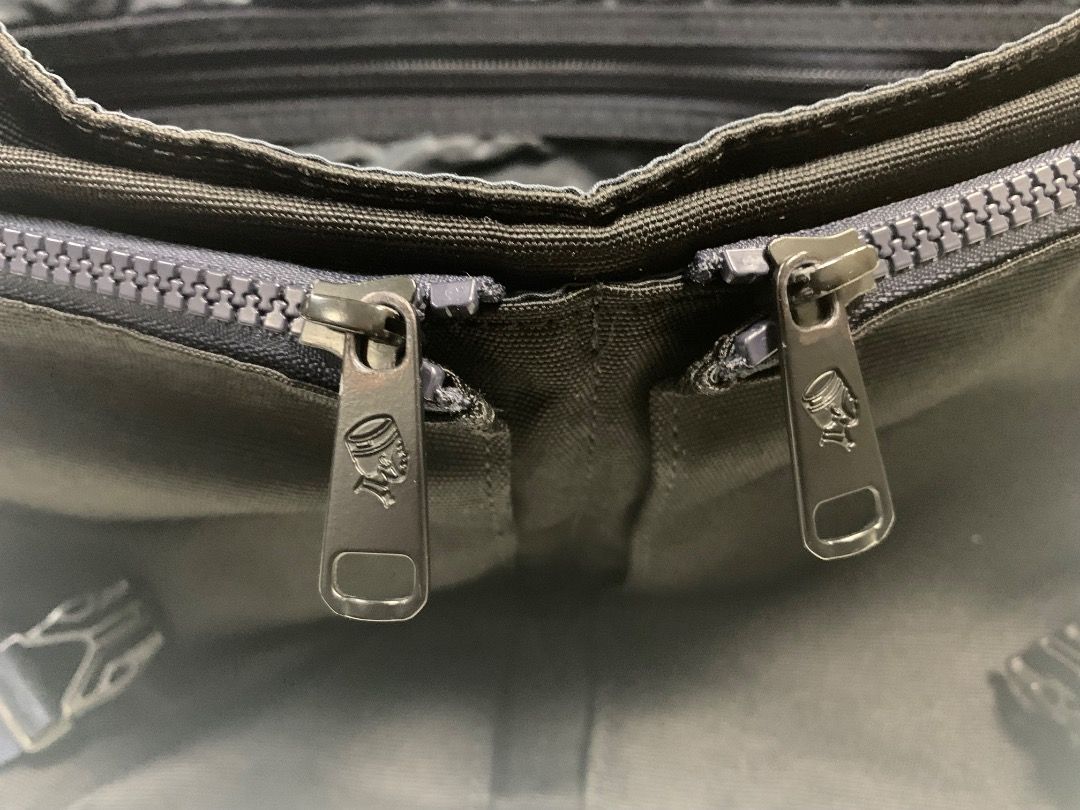 Porter Yoshida & Co. Black Canvas Backpack (Category: Backpacks) located in Pasay City. Submitted by wayne_stuff (Listing ID 1454999202, Image 2). Description: - Brand: Porter Yoshida & Co. - Color: Black - Material: Durable Canvas - Straps: Adjustable with buckle closures - Pockets: Front flap with side zippered pocket, main zippered compartment - Ideal for: Everyday use.