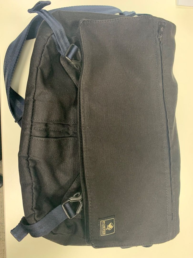 Porter Yoshida & Co. Black Canvas Backpack (Category: Backpacks) located in Pasay City. Submitted by wayne_stuff (Listing ID 1454999202, Image 3). Description: - Brand: Porter Yoshida & Co. - Color: Black - Material: Durable Canvas - Straps: Adjustable with buckle closures - Pockets: Front flap with side zippered pocket, main zippered compartment - Ideal for: Everyday use.