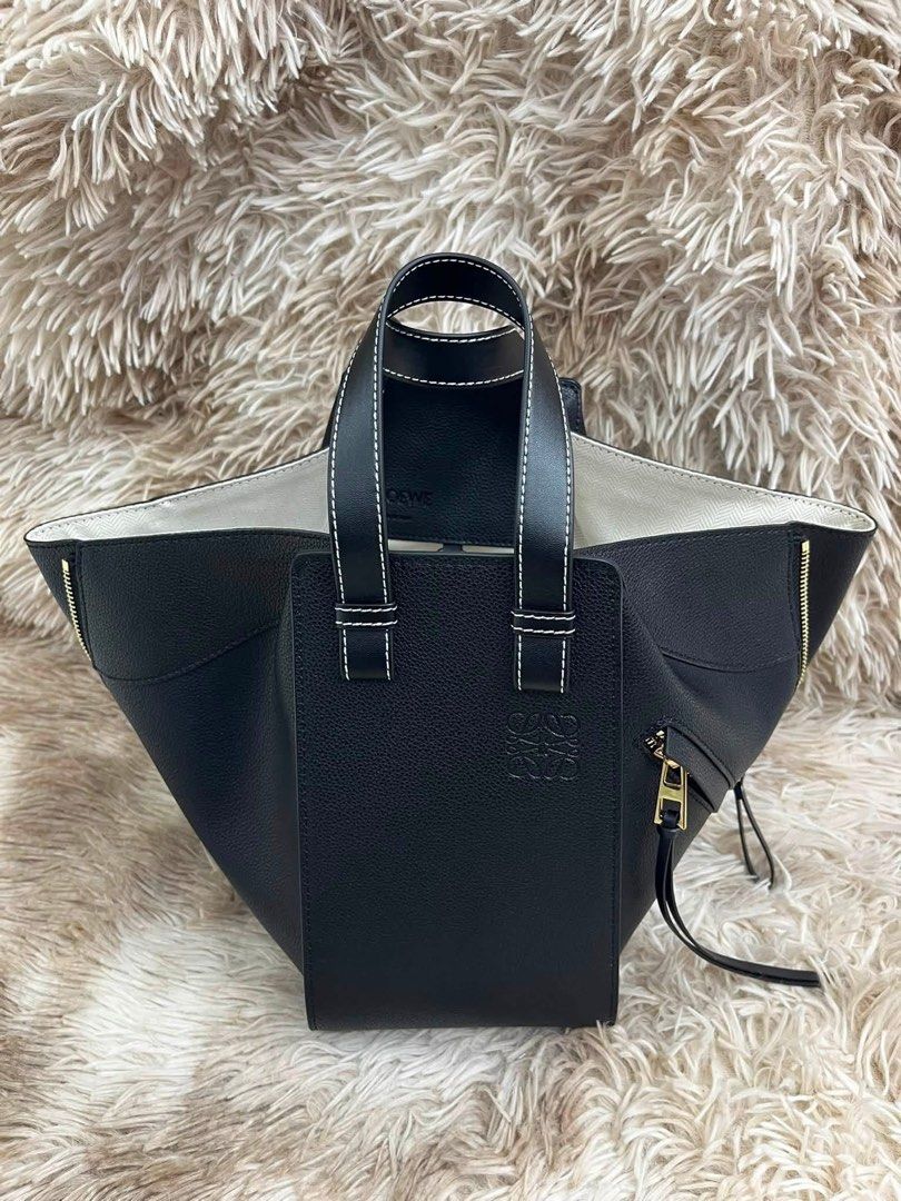 Preloved Loewe Hammock Classic Calfskin (Category: Luxury Bags & Wallets) located in Manila. Submitted by bagsandmanymanymore1 (Listing ID 1450338800, Image 3). Description: Preloved Hammock Magnetic closure Silver embossed LOEWE Hearingbone cotton canvas lining Detachable and adjustable strap Please read before you order 👉🏻❗️Payment first before shipping ❗️Cut off time of payment 11am sameday delivery ❗️NO MEET UP / NO PICK UP ❗️ORDER CANNOT B