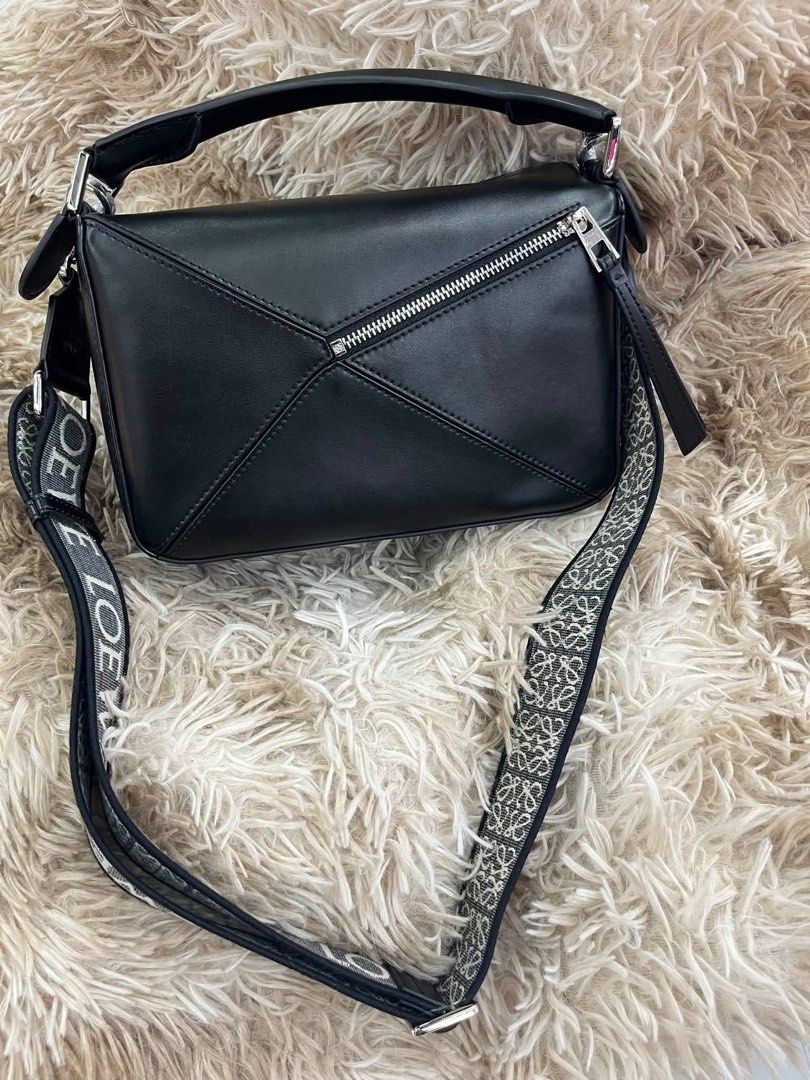 Preloved Loewe Puzzle Bag (Category: Luxury Bags & Wallets) located in Manila. Submitted by bagsandshoesmanymore (Listing ID 1440028754, Image 3). Description: Preloved Loewe Puzzle Bag Calfskin Genuine Leather Good condition Size 24.5cm Japan source Serial number Please read before you order 👉🏻❗️Payment first before shipping ❗️Cut off time of payment 11am sameday delivery ❗️NO MEET UP / NO PICK UP ❗️ORDER CANNOT BE CANCELLED ❗️PLEASE DON’T BUY
