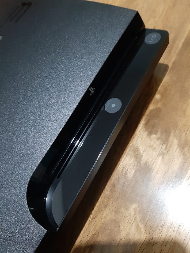 Ps3 slim US version (Category: PlayStation) located in Bacoor. Submitted by Sky10629 (Listing ID 1448416334, Image 3). Description: Ps3 slim US version - 110/220 autovolt CECH 3001A Mint condition - Unmolested 160Gb storage w/ Orig PS3 eye camera *No games installed *No Jailbreak cmos battery for replacement 2x original wireless controller ( 1 Dual Shock, 1 Sixaxis ) 6 Original Games w/ manuals ( See Pics for titles ) PACKAGE INCLUDES 1 PS3 unit 