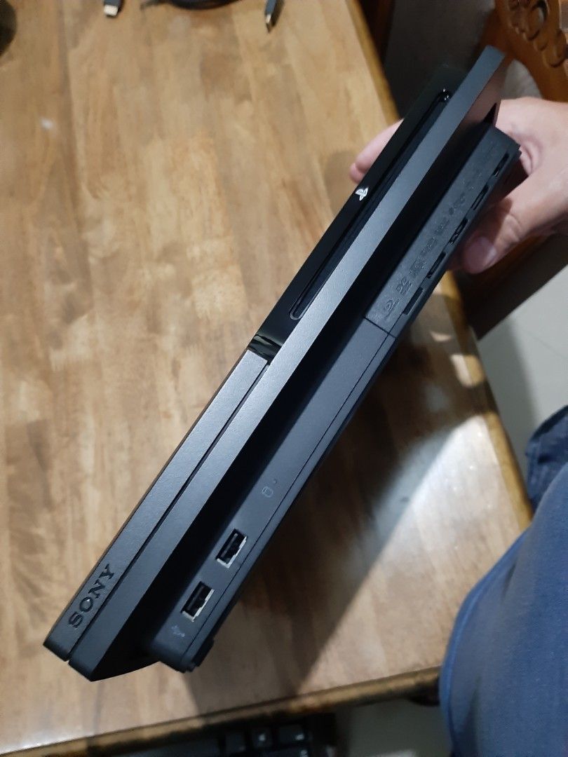 Ps3 slim US version (Category: PlayStation) located in Bacoor. Submitted by Sky10629 (Listing ID 1448416334, Image 2). Description: Ps3 slim US version - 110/220 autovolt CECH 3001A Mint condition - Unmolested 160Gb storage w/ Orig PS3 eye camera *No games installed *No Jailbreak cmos battery for replacement 2x original wireless controller ( 1 Dual Shock, 1 Sixaxis ) 6 Original Games w/ manuals ( See Pics for titles ) PACKAGE INCLUDES 1 PS3 unit 