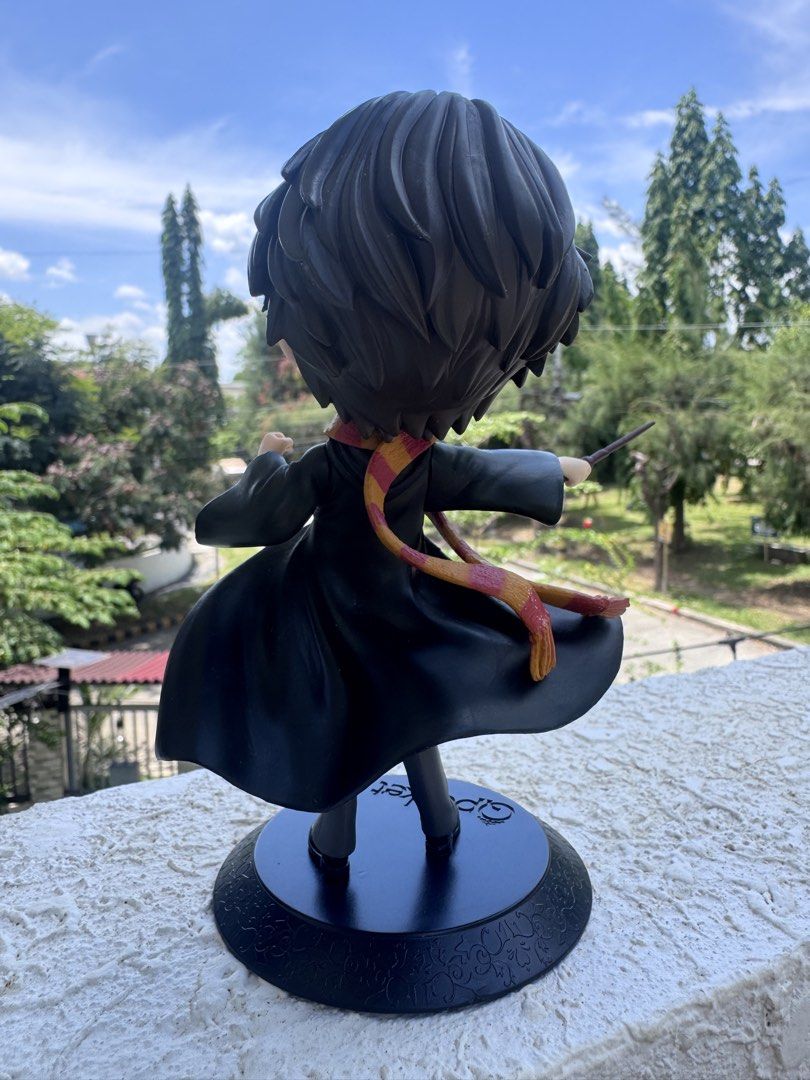 Authentic Qposket Harry Potter Figure with Wand (Category: Figurines & Statues) located in Caloocan City. Submitted by ciel31 (Listing ID 1454972764, Image 2). Description: - Authentic Qposket Harry Potter figure - Comes with wand and broomstick accessories - Features a black display base - Includes the original box - Ideal for any Harry Potter fan's collection.