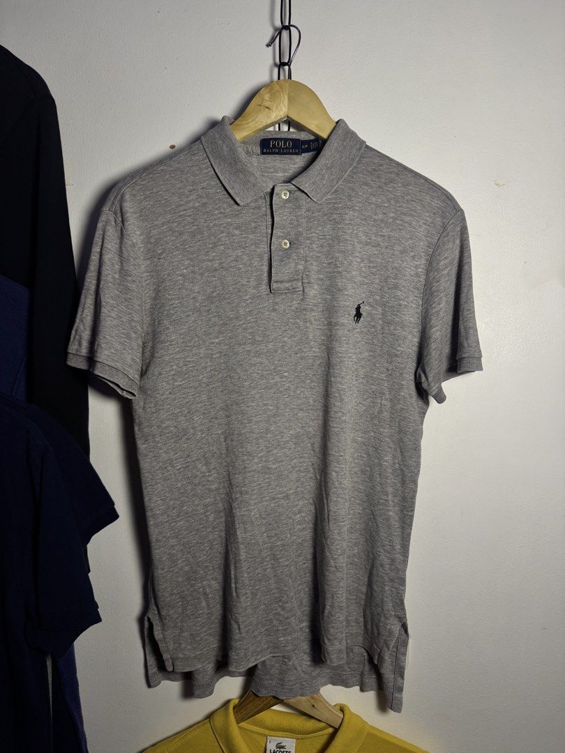 Ralph Lauren Polo Shirt Grey (Category: Tshirts & Polo Shirts ) located in Tabaco. Submitted by emmanyul (Listing ID 1455117669, Image 1). Description: - Made from 100% soft cotton for ultimate comfort - 19x26 - No Issues - Guaranteed Authentic - 10/10 Color Rate - Classic grey color, perfect for any outfit. - Easy to care for: machine washable in warm water with like colors. - Do not bleach. - Tumble dry on low heat. - Warm iron if needed. - A v