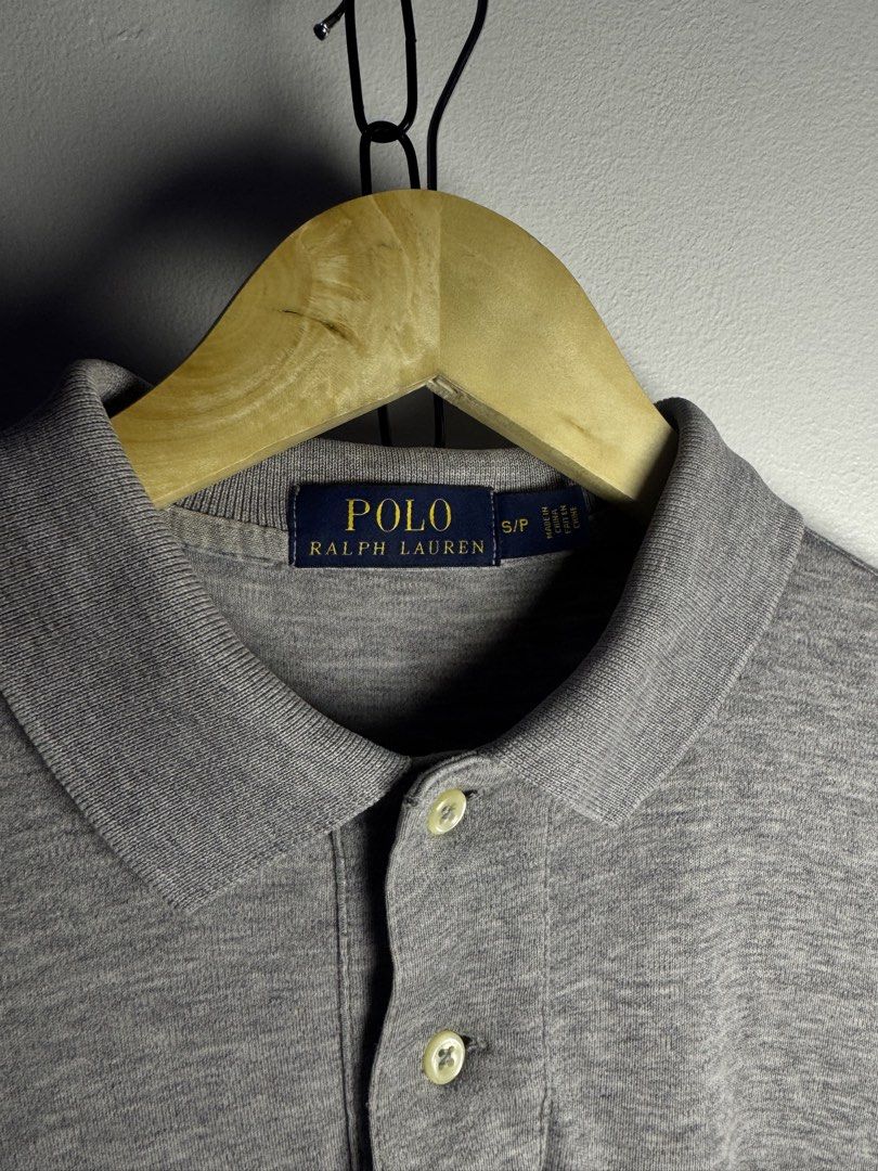 Ralph Lauren Polo Shirt Grey (Category: Tshirts & Polo Shirts ) located in Tabaco. Submitted by emmanyul (Listing ID 1455117669, Image 2). Description: - Made from 100% soft cotton for ultimate comfort - 19x26 - No Issues - Guaranteed Authentic - 10/10 Color Rate - Classic grey color, perfect for any outfit. - Easy to care for: machine washable in warm water with like colors. - Do not bleach. - Tumble dry on low heat. - Warm iron if needed. - A v