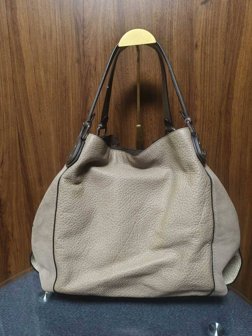 RARE Authentic Coach Edie Mixed Leather & Suede Hobo Bag (Prototype) (Category: Shoulder Bags) located in Baguio. Submitted by PreiLoveMaria (Listing ID 1455115854, Image 2). Description: RARE Authentic Coach Edie Mixed Leather & Suede Hobo Bag (Prototype) ​A true gem for Coach collectors! This is an authentic pre-production sample piece for the popular Coach Edie line, featuring the official internal "SAMPLE ONLY" tag and the signature 00000 sam