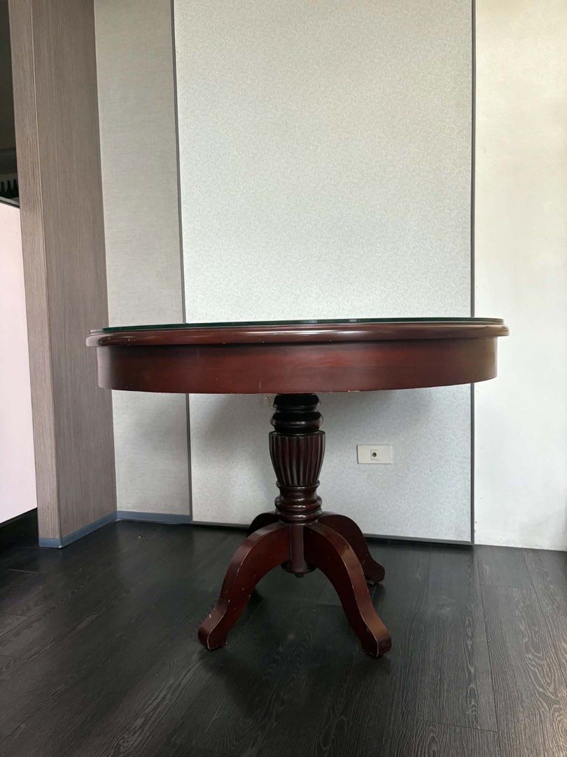 Round Wooden Coffee Table with Glass Top (Category: Tables & Sets) located in Manila. Submitted by _everythinguwant__ (Listing ID 1454986507, Image 2). Description: - good as new - can lalamove immediately! - negotiable for sure buyers.