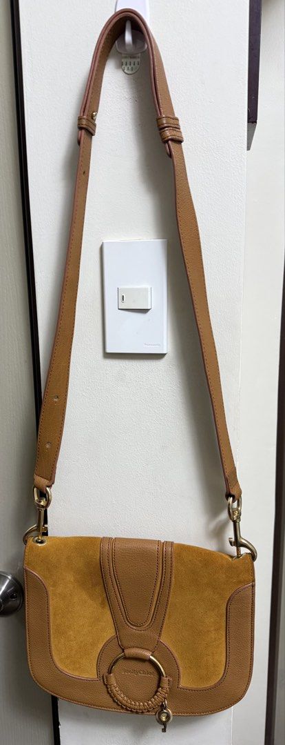 Seeby Chloe sling bag leather/suede (Category: Luxury Bags & Wallets) located in Pasig City. Submitted by davedeleon (Listing ID 1455109117, Image 1). Description: Leather and suede material Sling bag With dust bag No issues No trade Price excludes SF.