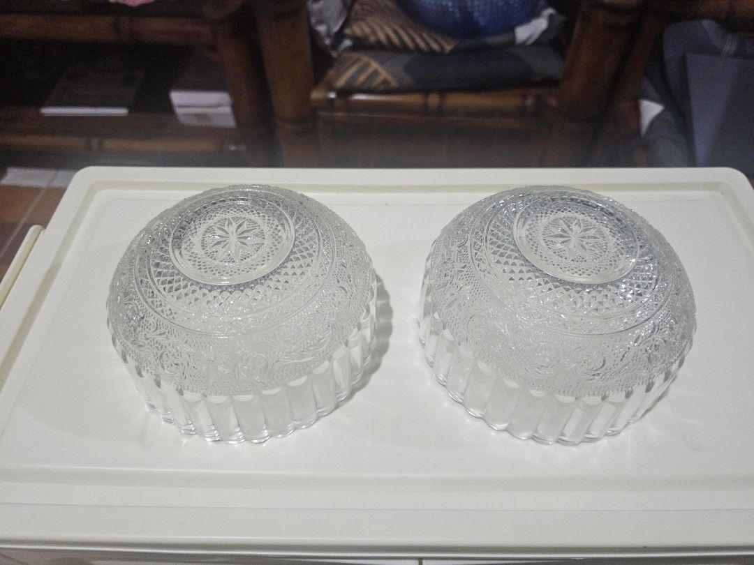 Set of 2 Clear Glass Bowls with Embossed Pattern (Category: Dinnerware & Cutlery) located in General Trias. Submitted by kittykate__ (Listing ID 1455069263, Image 3). Description: - Set of 2 clear glass bowls - Features beautiful embossed pattern on bottom and sides - Elegant fluted edges - Ideal for serving snacks, desserts, or as decorative pieces - Perfect size for individual servings - Clean and ready for a new home.