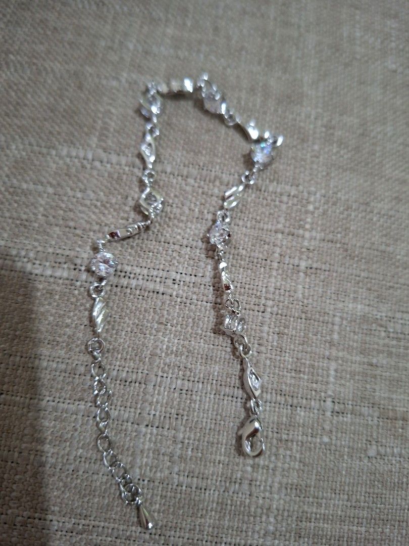 Silver-tone Bracelet with Clear Stones (Category: Bracelets) located in Bulacan. Submitted by rafaesarisari (Listing ID 1454951311, Image 1). Description: - Sparkly bracelet with clear stones - Delicate chain design - Adjustable clasp for a comfortable fit - Adds a touch of shine to any outfit - Perfect for gifting or personal treat.