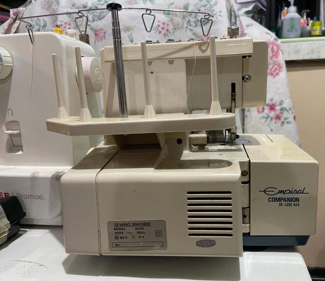 Singer Promise Sewing Machine & Empisal Overlocker (Category: Craft Supplies & Tools) located in Hinigaran. Submitted by faye_fab (Listing ID 1455014808, Image 3). Description: - Singer Promise sewing machine (white) - Empisal Companion De Luxe 400 overlocker (white) - Includes instruction manual for Singer Promise - Two foot pedals included - Ideal for various sewing projects - Ready for a new home.