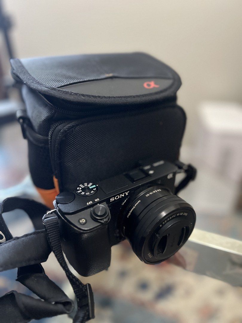 Sony Alpha a6400 Mirrorless Camera (Category: Cameras) located in Manila. Submitted by millekio (Listing ID 1455122184, Image 1). Description: Sony Alpha a6400 Mirrorless Camera Purchased from Sony Center Glorietta Package: Body, Kitlens, Lens cap, battery, charger, Camera Bag. Body is well used, LCD screen is damaged (accidentally fell while setting up tripod but still functional — replacements available around ₱3K - ₱5K) Test all you want upon 