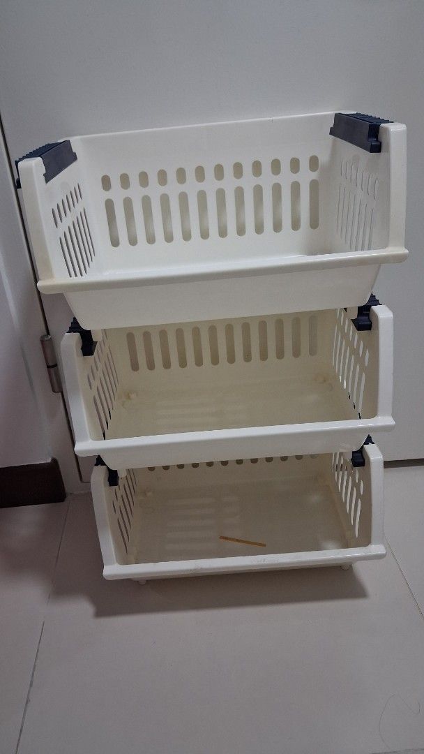 Stackable White Plastic Storage Baskets (Category: Storage Boxes & Baskets) located in Singapore. Submitted by letsbesimple (Listing ID 1455002539, Image 2). Description: - Set of 3 stackable storage baskets - White plastic with blue connecting clips - Ideal for organizing small items in cabinets or on shelves .