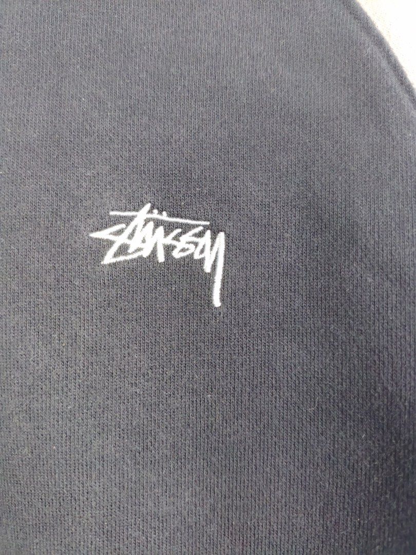 Stussy Colorblock Half Zip Sweatshirt (Category: Coats, Jackets and Outerwear) located in Manila. Submitted by declutterpromax (Listing ID 1455107528, Image 2). Description: - Stussy colorblock sweatshirt - Half zip neckline - Large front pocket - Raglan sleeves in beige - Main body: Black - Accents: Beige collar and cuffs - Size: L - Made in China.