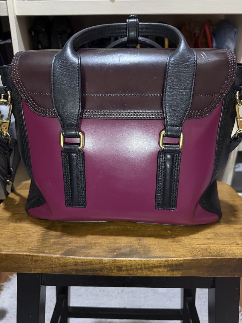 Tote bag (Category: Luxury Bags & Wallets) located in Pasig City. Submitted by emashopaholic (Listing ID 1455037896, Image 3). Description: Pre owned 3.1 Phillip Lim Pashli satchel Magenta/burgundy/black combo With long, leather strap With dust bag Issue: a few scratches on the lock A few scratches on the flap Gold hardware Selling low for only ₱ 19,500 Pasig pick up Shipping c/o buyer Bdo/bpi .