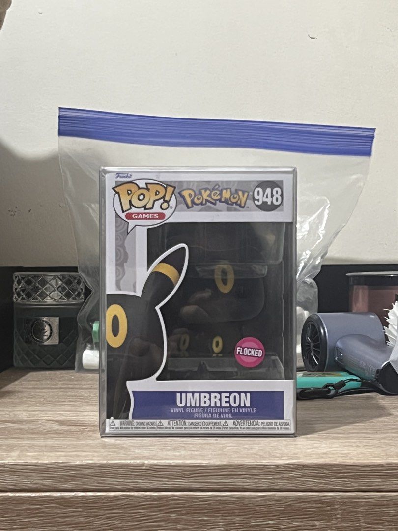 Umbreon Funko Pop (Category: Designer & Blind Box Toys) located in Mabalacat. Submitted by mnlang (Listing ID 1455115690, Image 1). Description: - Funko Pop! #948: Umbreon (Pokemon) - Flocked Version: Features a fuzzy texture - w/ free hard case - never opened .
