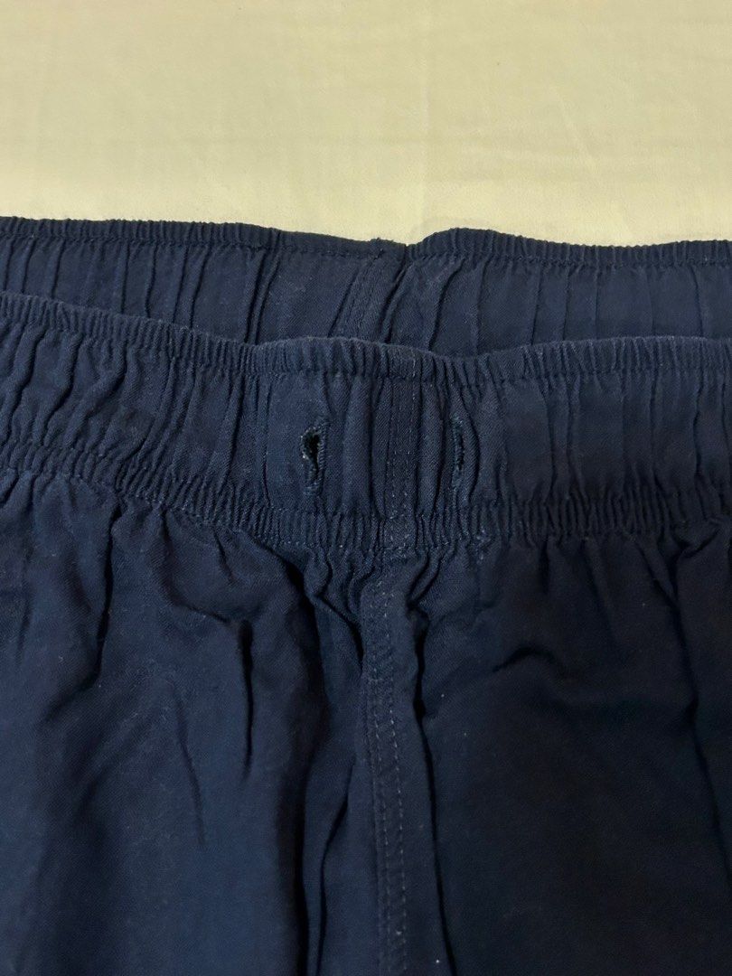 Uniqlo Navy Blue Lounge Pants (Category: Other Bottoms) located in Quezon City. Submitted by m4delineee (Listing ID 1455128315, Image 3). Description: - size: S - navy blue cotton loungepants w/ elastic waistband from uniqlo - missing the tie!! (see 3rd pic) but still sakto sa waist .