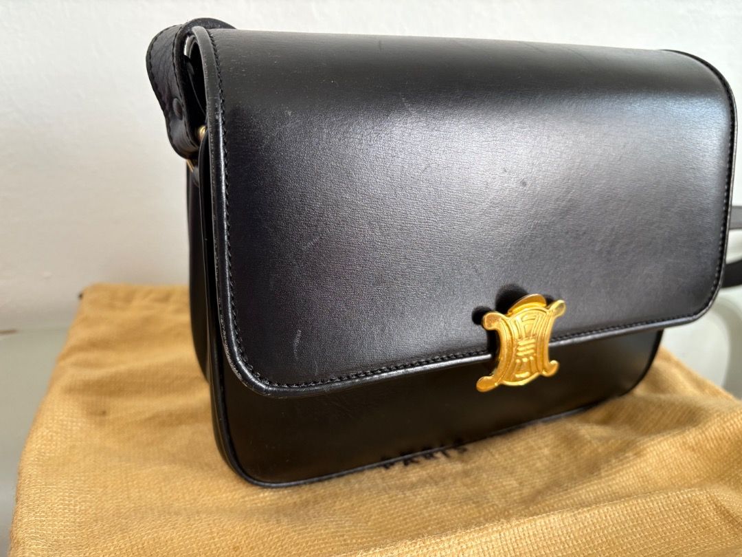 Vintage Celine Triomphe (Category: Luxury Bags & Wallets) located in Quezon City. Submitted by icecreammonster (Listing ID 1454953781, Image 2). Description: Vintage Celine Triomphe Color: Black Bought in Japan Please refer to photos for signs of usage, but still in very good condition Comes with a dustbag.