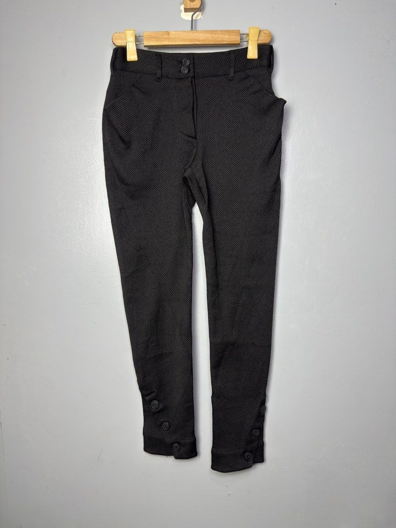 Vivienne Westwood Pants (Category: Other Bottoms) located in Manila. Submitted by dipdrip (Listing ID 1455081557, Image 1). Description: - Textured black pants - Button details at the ankle - High-waisted fit - Double button front closure - Functional front pockets - Perfect for dressing up or down DIMENSIONS Waist : 28 Length : 40 Thigh : 10.5 Inseam : 30 Leg opening : 5.5 Measurements are in (INCHES) Condition In excellent condition 1,000php Ne