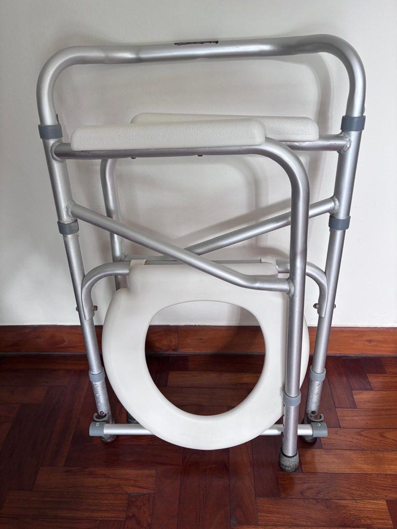walker, commode (Category: Medical Supplies & Tools) located in Singapore. Submitted by mochi.chi (Listing ID 1455140021, Image 1). Description: - Foldable commode chair with seat - Provides mobility and toileting support - Lightweight and easy to store - Meetups available at Lorong Chuan MRT Station.