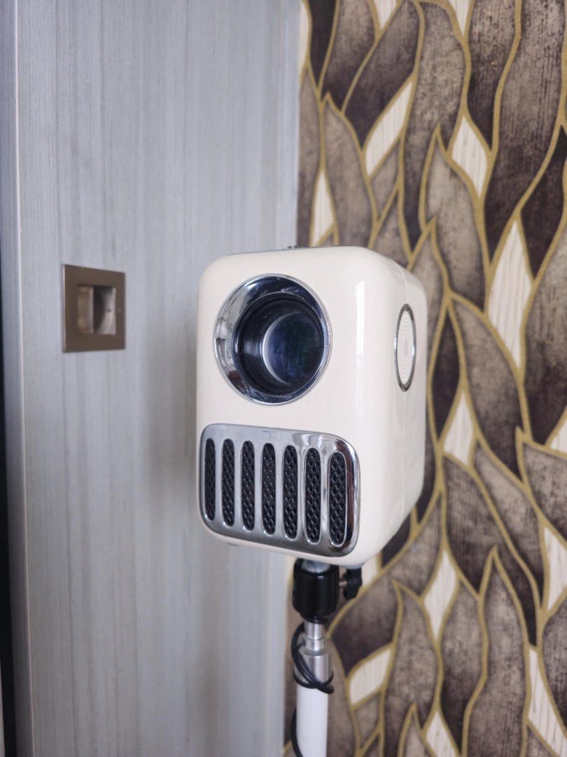 Wanbo T2R (Category: Projectors) located in Mandaluyong City. Submitted by nicxannc (Listing ID 1455043435, Image 2). Description: Xiaomi Wanbo T2R Resolution: Native Full HD 1080P with 4K decoding supportBrightness: 350 ANSI lumensOperating System: Powered by Android TV 9.0 with built-in Wi-Fi and BluetoothDesign Features: Compact, retro-styled white casing with electronic keystone correction and a fully sealed optical engine .