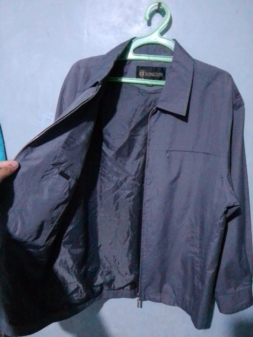 YONGXIN Grey Harrington Jacket (Category: Coats, Jackets and Outerwear) located in Navotas City. Submitted by _ryujin (Listing ID 1455105333, Image 2). Description: Dimensions Width: 23.5 to 24 Length: 28 No issue good as new condition - Brand: YONGXIN - Color: Grey - Style: Zip-up jacket - Size: L (175/92A) - Pockets: 1 zippered chest pocket, 2 side pockets - Interior: Fully lined - Usage: Casual wear, layering Dm if you're interested thank you!