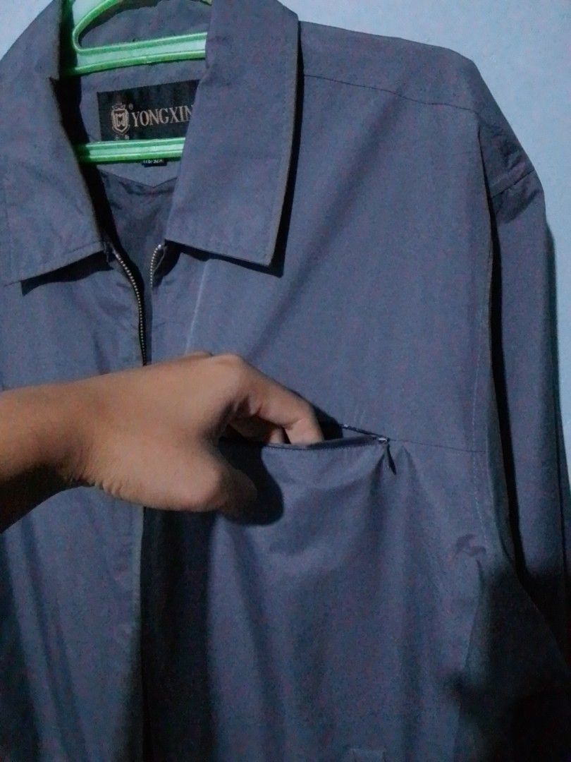 YONGXIN Grey Harrington Jacket (Category: Coats, Jackets and Outerwear) located in Navotas City. Submitted by _ryujin (Listing ID 1455105333, Image 3). Description: Dimensions Width: 23.5 to 24 Length: 28 No issue good as new condition - Brand: YONGXIN - Color: Grey - Style: Zip-up jacket - Size: L (175/92A) - Pockets: 1 zippered chest pocket, 2 side pockets - Interior: Fully lined - Usage: Casual wear, layering Dm if you're interested thank you!