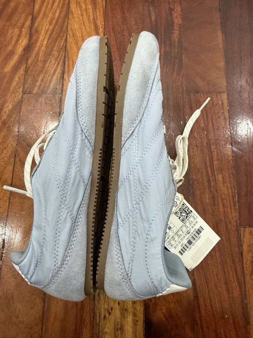 ZARA Light Blue Suede Nylon Sneakers Size 36 (Category: Sneakers) located in Pasig City. Submitted by atbp__ (Listing ID 1454972926, Image 3). Description: - Zara light blue sneakers - Size: 36 EUR - Material: Mix of suede and nylon - Style: Lace-up - Features: Original tags attached.