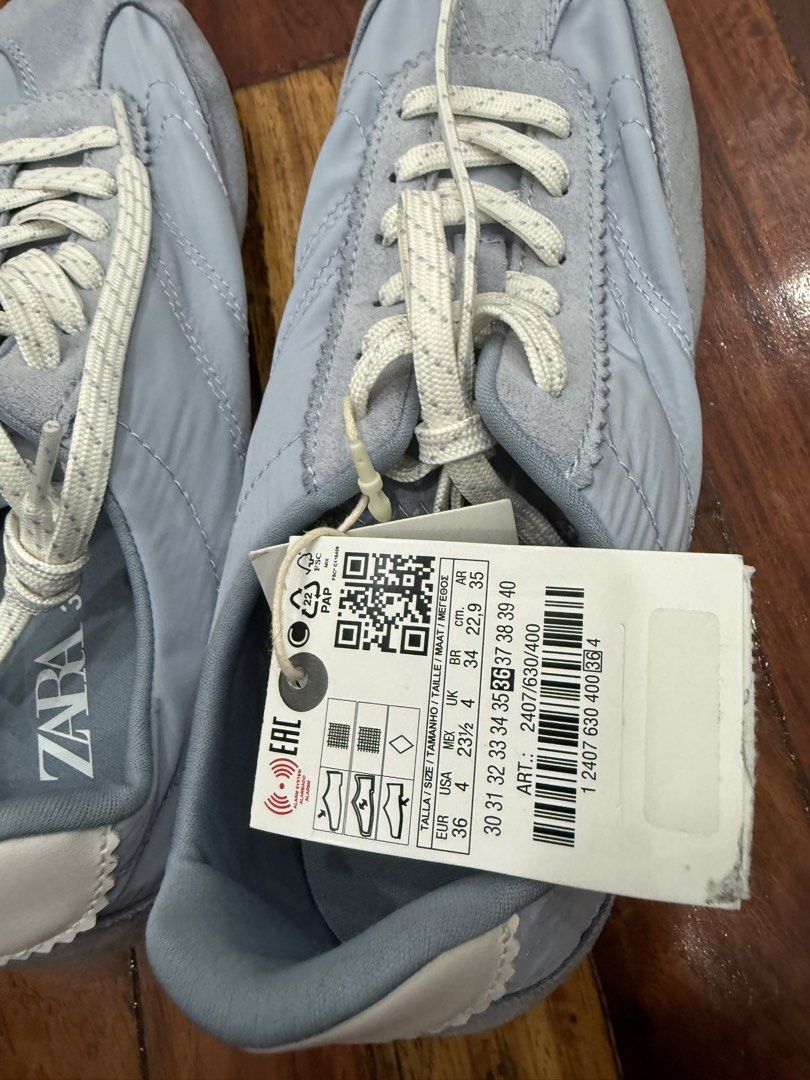 ZARA Light Blue Suede Nylon Sneakers Size 36 (Category: Sneakers) located in Pasig City. Submitted by atbp__ (Listing ID 1454972926, Image 2). Description: - Zara light blue sneakers - Size: 36 EUR - Material: Mix of suede and nylon - Style: Lace-up - Features: Original tags attached.