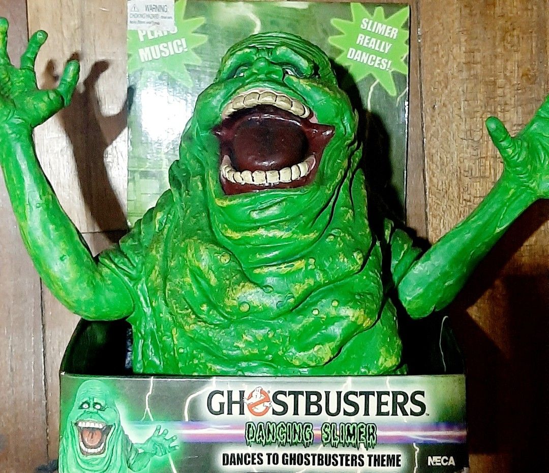 2005 NECA Ghostbusters Dancing Slimer (Category: Figurines & Statues) located in Liloan. Submitted by angelyneroberts_171329 (Listing ID 1455321479, Image 1). Description: FOR SALE NECA Ghostbusters Dancing Slimer DESCRIPTION : - Released year 2005 - NECA (Reel Toys) - Slimer ("Onionhead") from Ghostbusters - Musical animated base that moves the figure to the theme tune (çan't check/replace battery since figure is mint in packaging). CONDITION : 