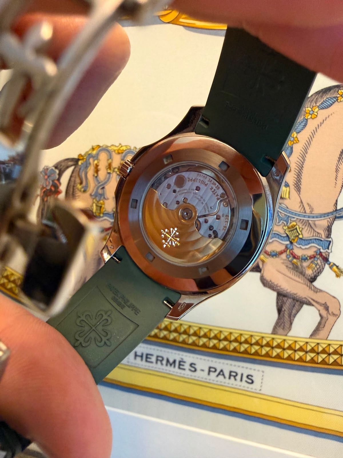 2022 Patek Philippe Aquanaut Jumbo “20th Anniversary” 5168G-010 Khaki Green Dial Automatic White Gold Casing Rubber (Category: Watches) located in Singapore. Submitted by staplergo (Listing ID 1455266676, Image 2). Description: Sep 2022 Patek Philippe 5168G Green Aquanaut Jumbo “20th Anniversary” for sale. Model : 5168G-010 Also known as : Aquanaut Jumbo “20th Anniversary” Case size : 42mm Dial : Khaki Green Dial With Luminous Baton Numerals Inde