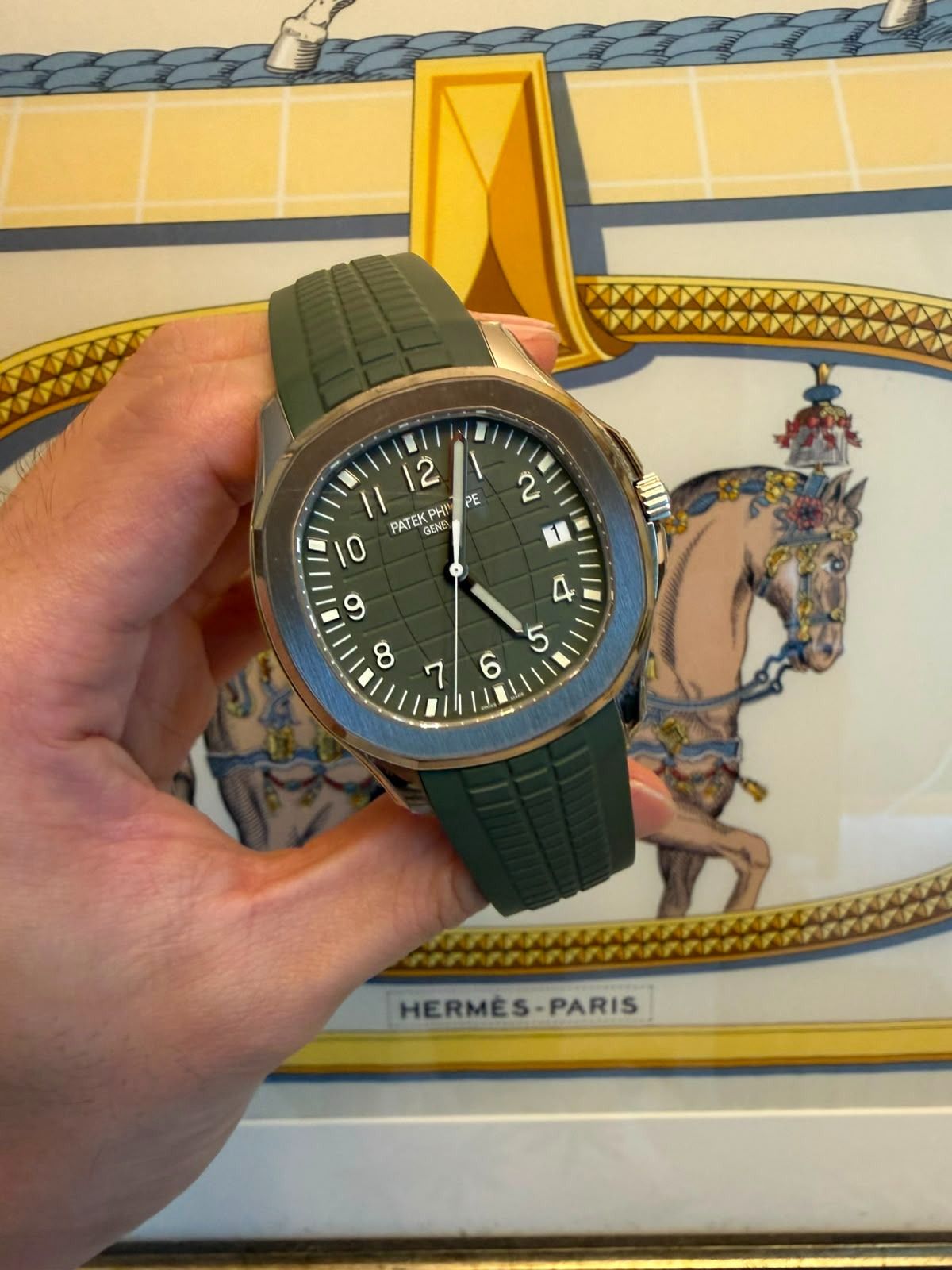 2022 Patek Philippe Aquanaut Jumbo “20th Anniversary” 5168G-010 Khaki Green Dial Automatic White Gold Casing Rubber (Category: Watches) located in Singapore. Submitted by staplergo (Listing ID 1455266676, Image 1). Description: Sep 2022 Patek Philippe 5168G Green Aquanaut Jumbo “20th Anniversary” for sale. Model : 5168G-010 Also known as : Aquanaut Jumbo “20th Anniversary” Case size : 42mm Dial : Khaki Green Dial With Luminous Baton Numerals Inde