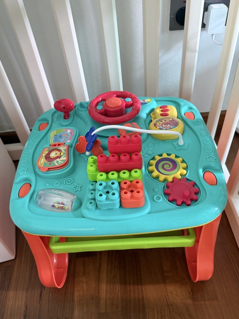 Activity table (Category: Infant Playtime) located in Singapore. Submitted by shaynawoon (Listing ID 1455202636, Image 1). Description: Selling because got people gifted a new activity table relatively new only play loosely for 1 month .