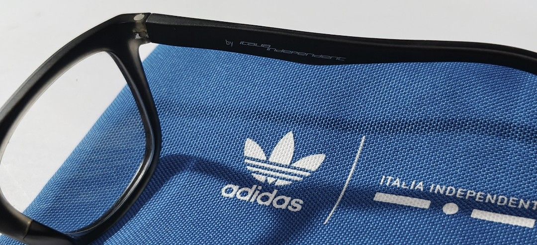 Adidas Italia Independent (Category: Sunglasses & Eyewear) located in General Trias. Submitted by ecsandt (Listing ID 1455274907, Image 3). Description: + Matte Black Frame Eyeglasses + Includes: Blue Adidas pouch + Versatile style for everyday wear or fashion statement + Feature: Clean design, ready for prescription lenses.