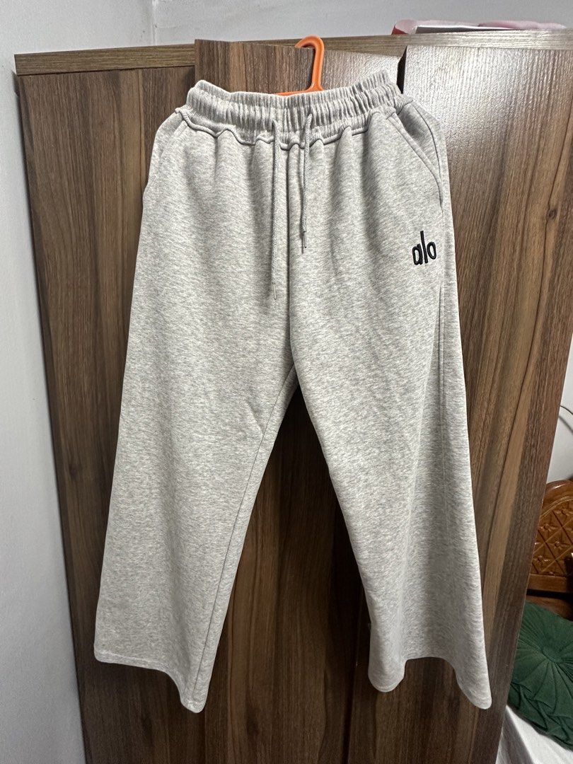 Alo Yoga Grey Sweatpants (Category: Other Bottoms) located in General Trias. Submitted by jd_15 (Listing ID 1455304154, Image 2). Description: - Brand: Alo Yoga - Color: Grey - Features: Elastic waistband with drawstring, two side pockets - Style: Comfortable, casual - Use: Ideal for lounging or light workouts - Versatility: Easily pairs with any top.