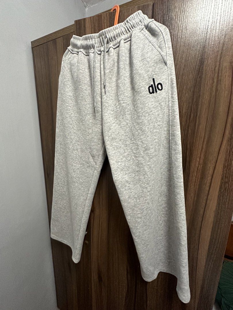 Alo Yoga Grey Sweatpants (Category: Other Bottoms) located in General Trias. Submitted by jd_15 (Listing ID 1455304154, Image 1). Description: - Brand: Alo Yoga - Color: Grey - Features: Elastic waistband with drawstring, two side pockets - Style: Comfortable, casual - Use: Ideal for lounging or light workouts - Versatility: Easily pairs with any top.