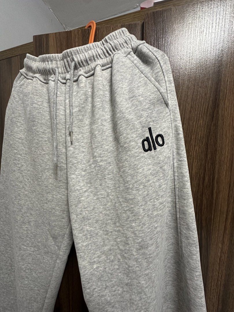 Alo Yoga Grey Sweatpants (Category: Other Bottoms) located in General Trias. Submitted by jd_15 (Listing ID 1455304154, Image 3). Description: - Brand: Alo Yoga - Color: Grey - Features: Elastic waistband with drawstring, two side pockets - Style: Comfortable, casual - Use: Ideal for lounging or light workouts - Versatility: Easily pairs with any top.