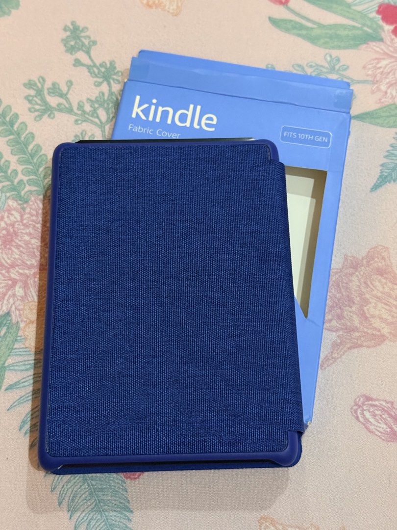 Amazon Kindle Fabric Cover for 10th Gen Kindle (Category: E-Readers) located in Hermosa. Submitted by bookwormhermosa (Listing ID 1455261118, Image 1). Description: - Blue fabric cover for 10th Gen Kindle - Protects your device - Snug fit - Comes with original packaging - Keeps your Kindle safe and looking good.