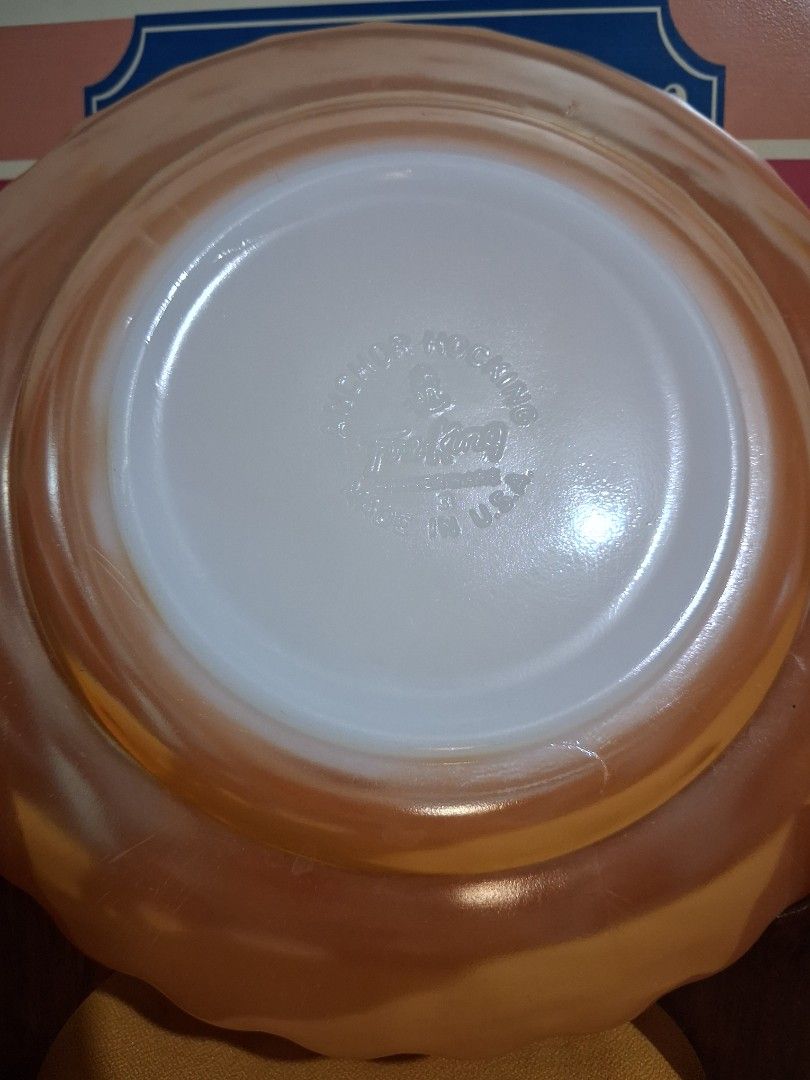 Anchor Hocking Fire King Peach Luster Bowl (Category: Dinnerware & Cutlery) located in Hinigaran. Submitted by faye_fab (Listing ID 1455225558, Image 2). Description: - Vintage Anchor Hocking Fire King bowl - Beautiful peach lusterware finish - Exterior swirl pattern - Perfect for serving or display - Approximately 8 inches in diameter - No chips or cracks observed.
